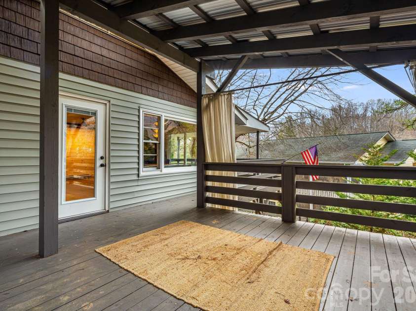 61 White Dogwood Lane, Lake Junaluska, NC 28745.  MLS# CAR4344094, YatesRealty ID 22998. Deck off kitchen, dining area
