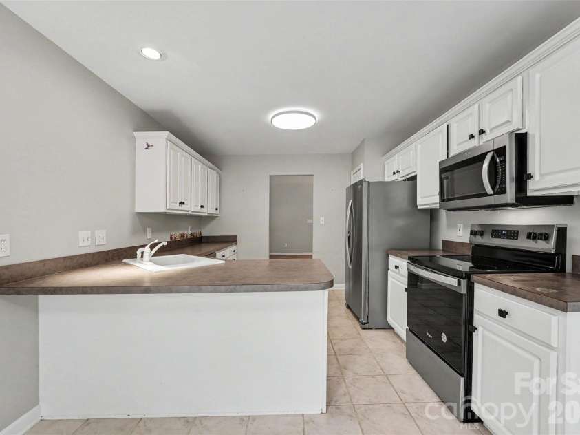 119 Stumpy Creek Road, Mooresville, NC 28117.  MLS# CAR4378604, YatesRealty ID 22999. 
