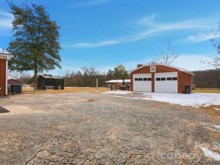 7511 Old Mocksville Road, Salisbury, NC 28144.  MLS# CAR4342046, YatesRealty ID 2300. Detached full brick garage