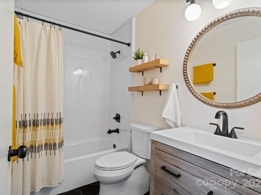7656 Eastbourne Road, Charlotte, NC 28227.  MLS# CAR4238426, YatesRealty ID 23000. Hall Bathroom