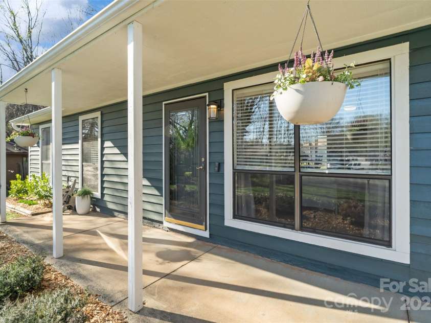 7656 Eastbourne Road, Charlotte, NC 28227.  MLS# CAR4238426, YatesRealty ID 23000. Inviting Porch