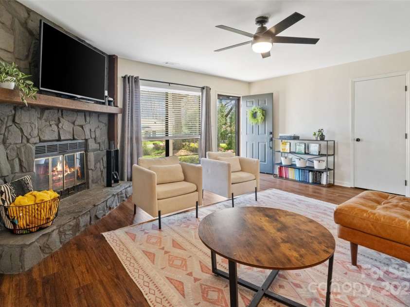 7656 Eastbourne Road, Charlotte, NC 28227.  MLS# CAR4238426, YatesRealty ID 23000. Living Room with Fireplace