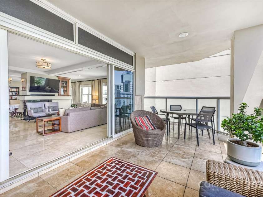 520 Martin Luther King Jr Boulevard, Charlotte, NC 28202.  MLS# CAR4260279, YatesRealty ID 23004. Double sliders bring in the energy of the city.