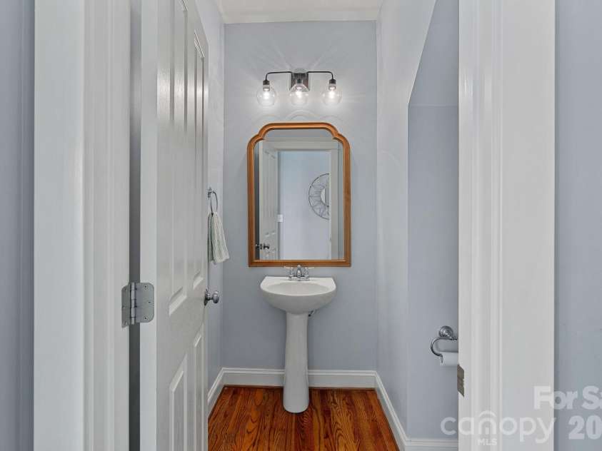 5595 Morris Hunt Drive, Fort Mill, SC 29708.  MLS# CAR4359670, YatesRealty ID 23004. Main floor half bath