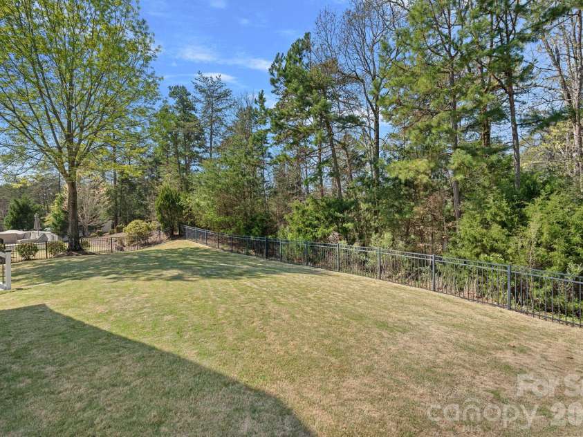5595 Morris Hunt Drive, Fort Mill, SC 29708.  MLS# CAR4359670, YatesRealty ID 23004. Private fenced backyard