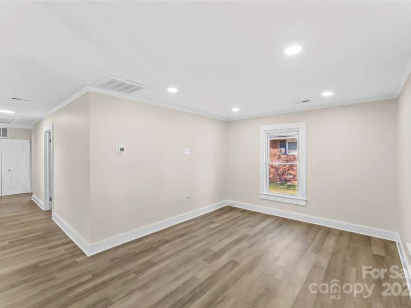 1102 Venus Street, Kannapolis, NC 28083.  MLS# CAR4263582, YatesRealty ID 23008. Living Room and hallway