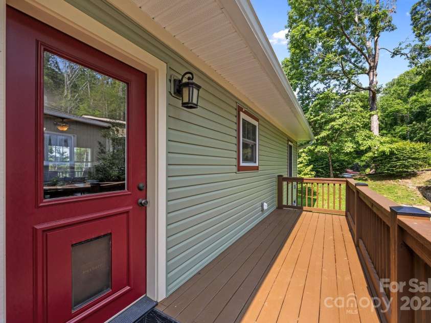 17 Laurel Road, Arden, NC 28704.  MLS# CAR4265020, YatesRealty ID 23009. Back door with dog door (can be replaced with full glass door, if preferred)