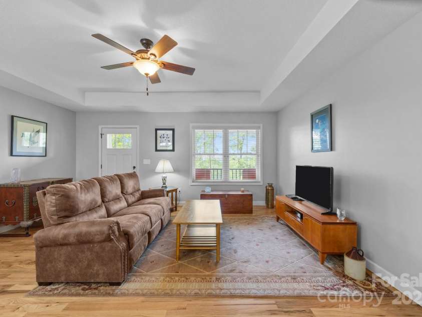 17 Laurel Road, Arden, NC 28704.  MLS# CAR4265020, YatesRealty ID 23009. Living room with tray ceiling