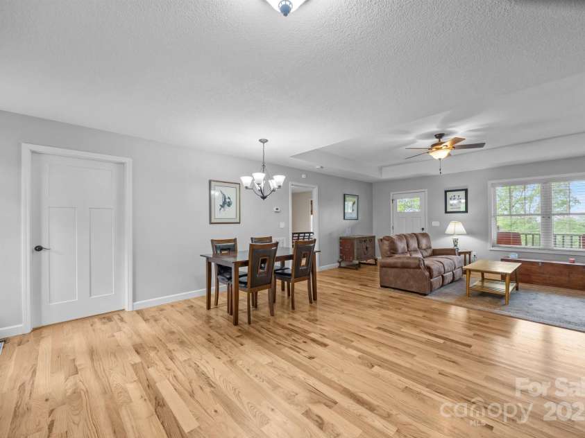 17 Laurel Road, Arden, NC 28704.  MLS# CAR4265020, YatesRealty ID 23009. Looking towards primary bedroom and front door