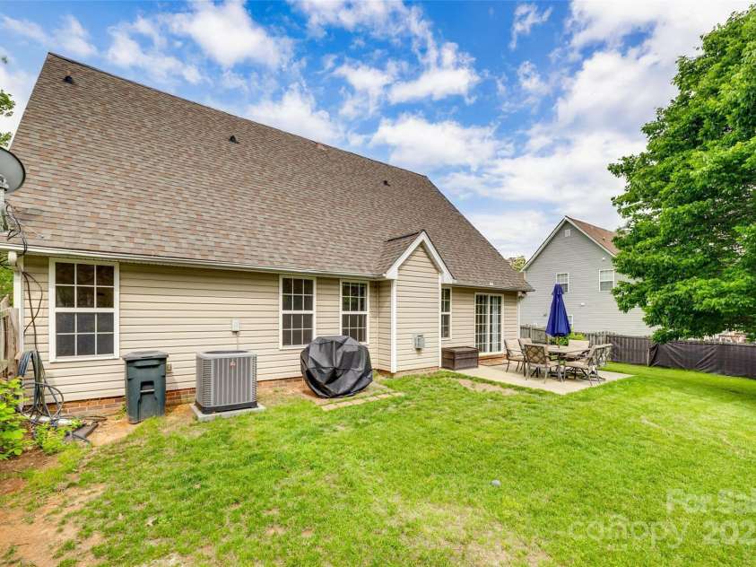 1835 Montague Road, Clover, SC 29710.  MLS# CAR4252009, YatesRealty ID 23014. Extended Patio & Private Backyard