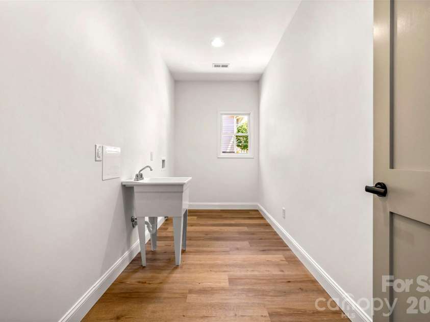 210 Westwood Drive, Forest City, NC 28043.  MLS# CAR4381670, YatesRealty ID 23015. Laundry Room