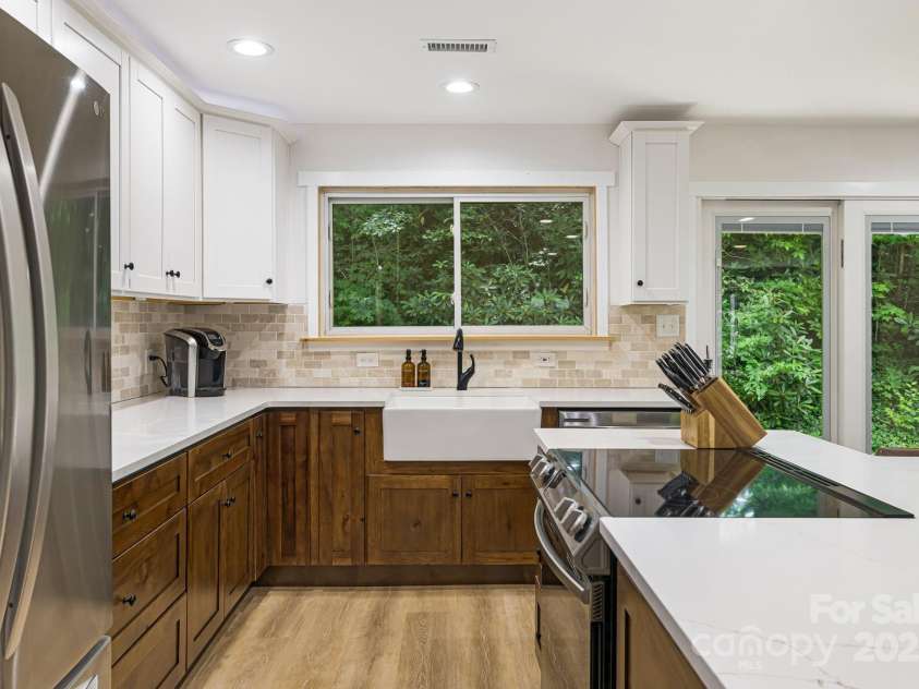 487 Duncan Creek Road, Fletcher, NC 28732.  MLS# CAR4269119, YatesRealty ID 23016. Deep Farmhouse Sink & Modern Fixtures