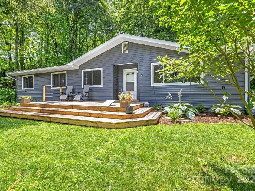 487 Duncan Creek Road, Fletcher, NC 28732.  MLS# CAR4269119, YatesRealty ID 23016. Front Exterior – Updated Porch & Landscaping