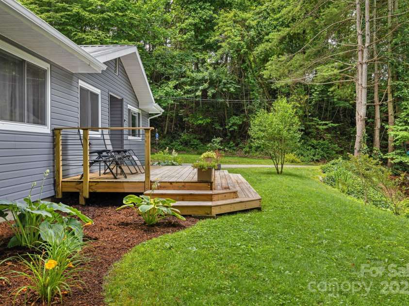 487 Duncan Creek Road, Fletcher, NC 28732.  MLS# CAR4269119, YatesRealty ID 23016. Front Porch Landscaping Detail – Fresh Exterior Paint