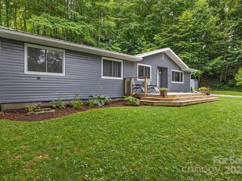487 Duncan Creek Road, Fletcher, NC 28732.  MLS# CAR4269119, YatesRealty ID 23016. Peaceful Wooded Setting