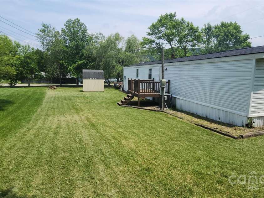 67 Brown Lynch Road, Candler, NC 28715.  MLS# CAR4270634, YatesRealty ID 23018. Backyard