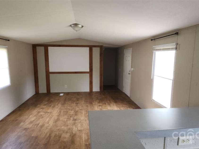 67 Brown Lynch Road, Candler, NC 28715.  MLS# CAR4270634, YatesRealty ID 23018. Living room