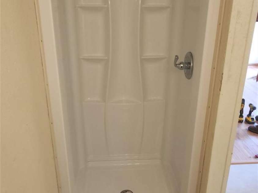 67 Brown Lynch Road, Candler, NC 28715.  MLS# CAR4270634, YatesRealty ID 23018. New shower surround
