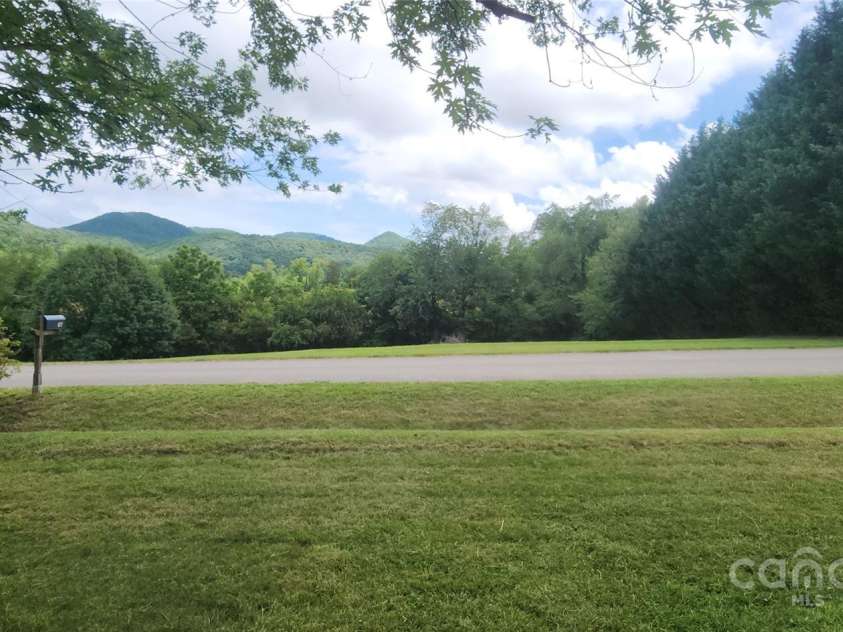 67 Brown Lynch Road, Candler, NC 28715.  MLS# CAR4270634, YatesRealty ID 23018. View from firepit