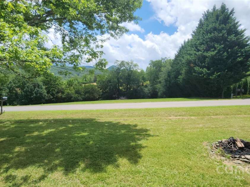 67 Brown Lynch Road, Candler, NC 28715.  MLS# CAR4270634, YatesRealty ID 23018. Views from deck