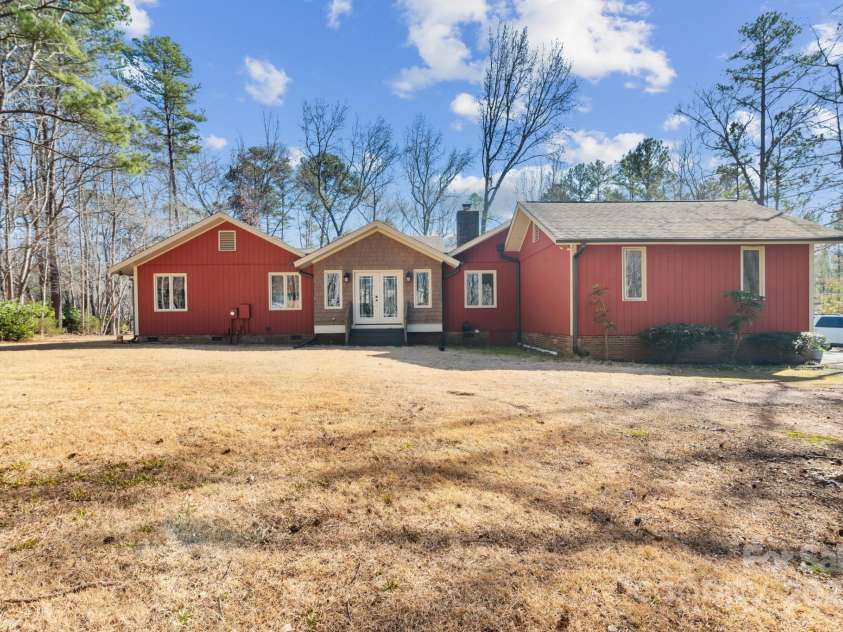 3406 Red Fox Trail, Weddington, NC 28104.  MLS# CAR4214440, YatesRealty ID 2302. Back of Home - large yard