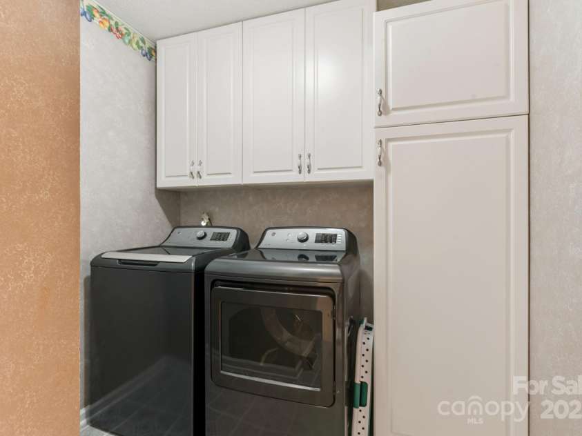 3406 Red Fox Trail, Weddington, NC 28104.  MLS# CAR4214440, YatesRealty ID 2302. Laundry Room off of Bedroom Hallway