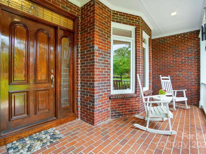 1042 Heather Glen Drive, Matthews, NC 28104.  MLS# CAR4270190, YatesRealty ID 23020. Covered Front Porch