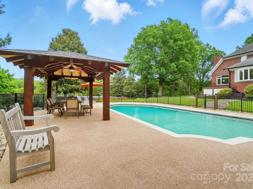 1042 Heather Glen Drive, Matthews, NC 28104.  MLS# CAR4270190, YatesRealty ID 23020. Custom Built wired Pergola