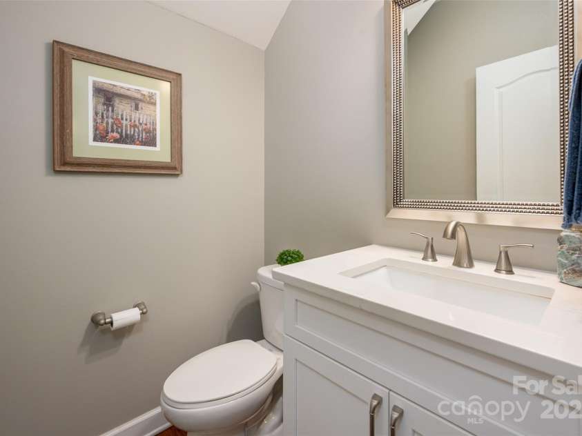 1805 Trading Path Lane, Waxhaw, NC 28173.  MLS# CAR4273259, YatesRealty ID 23032. Powder bath with new vanity and quartz top