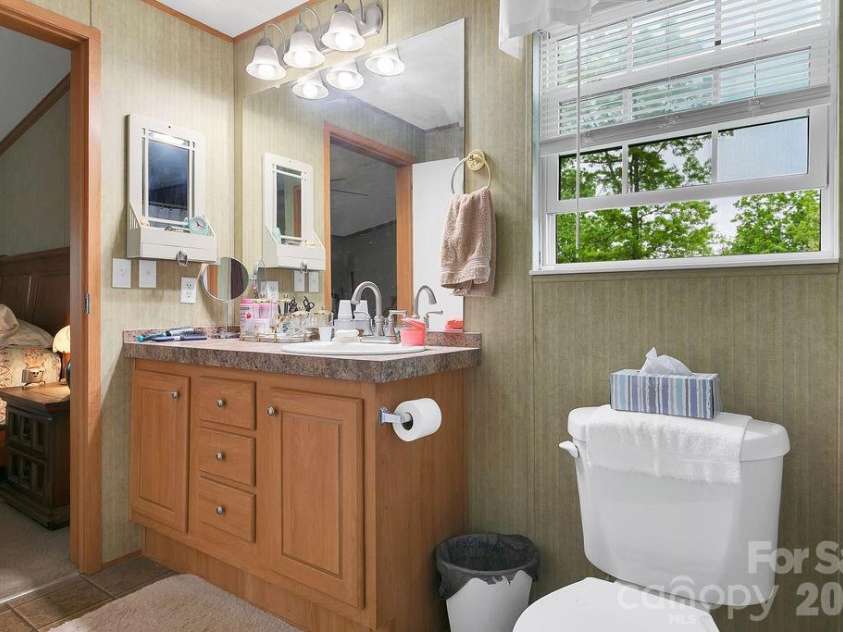 111 Wild Hog Creek Road, Rosman, NC 28772.  MLS# CAR4380401, YatesRealty ID 23035. Primary Bath