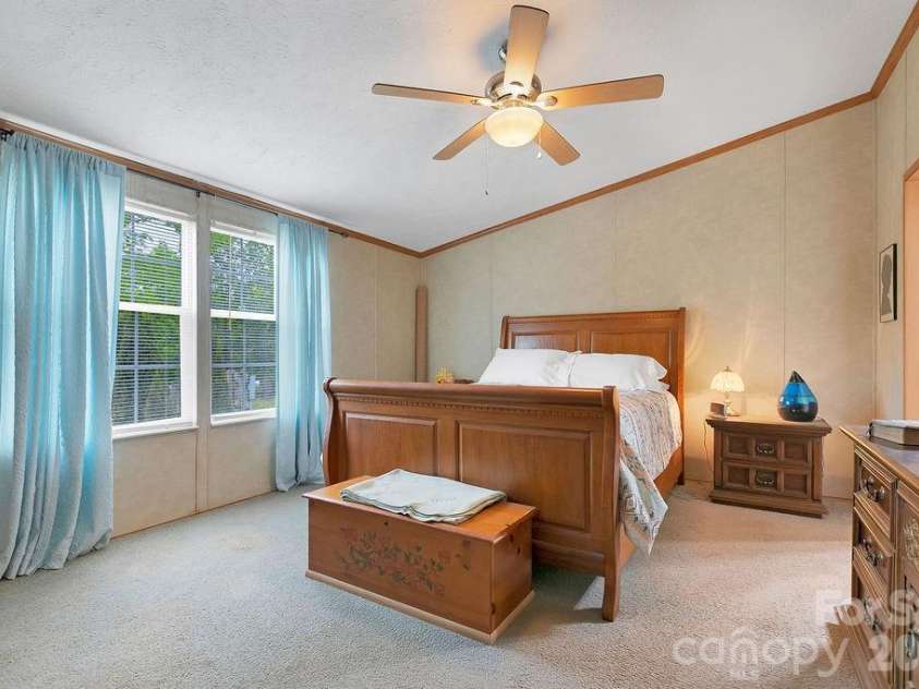 111 Wild Hog Creek Road, Rosman, NC 28772.  MLS# CAR4380401, YatesRealty ID 23035. Primary Bedroom
