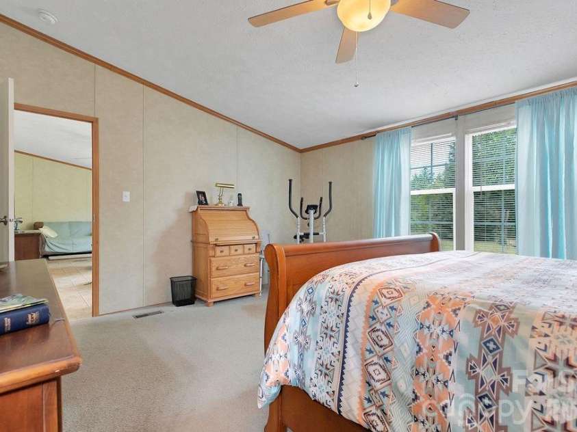 111 Wild Hog Creek Road, Rosman, NC 28772.  MLS# CAR4380401, YatesRealty ID 23035. Primary Bedroom