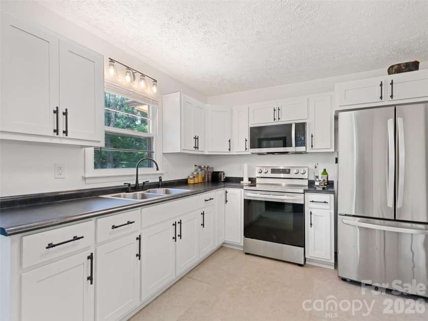 182 Fairway Hills Drive, Waynesville, NC 28786.  MLS# CAR4383027, YatesRealty ID 23037. 