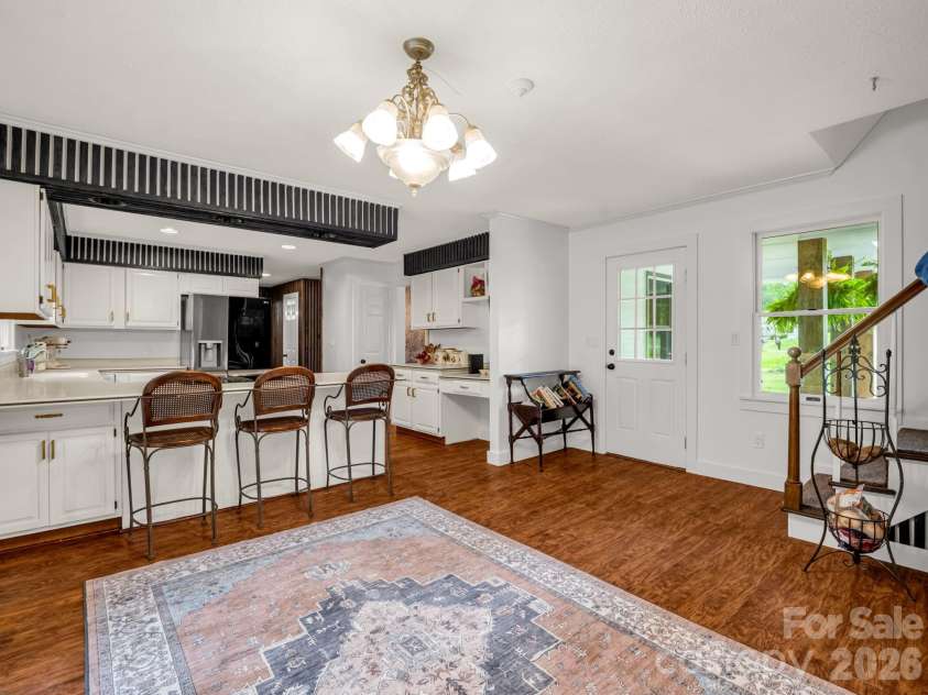 213 Raintree Drive, Hendersonville, NC 28791.  MLS# CAR4379526, YatesRealty ID 2304. Breakfast/Dining Area From Garage