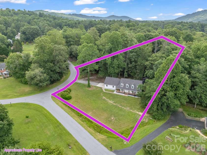 213 Raintree Drive, Hendersonville, NC 28791.  MLS# CAR4379526, YatesRealty ID 2304. On a short cul-de-sac road with privacy!