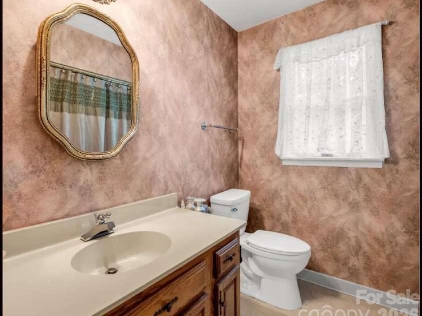 213 Raintree Drive, Hendersonville, NC 28791.  MLS# CAR4417820, YatesRealty ID 2304. 