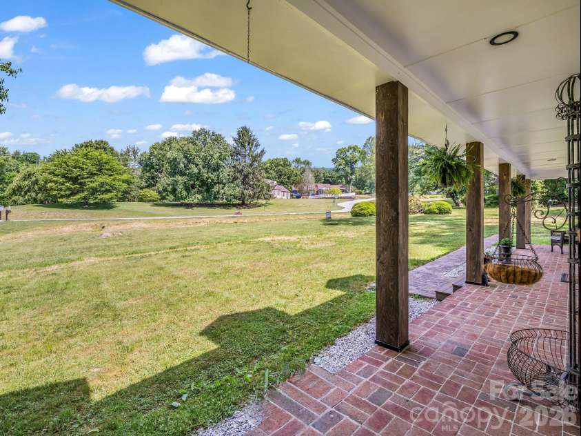 213 Raintree Drive, Hendersonville, NC 28791.  MLS# CAR4417820, YatesRealty ID 2304. 