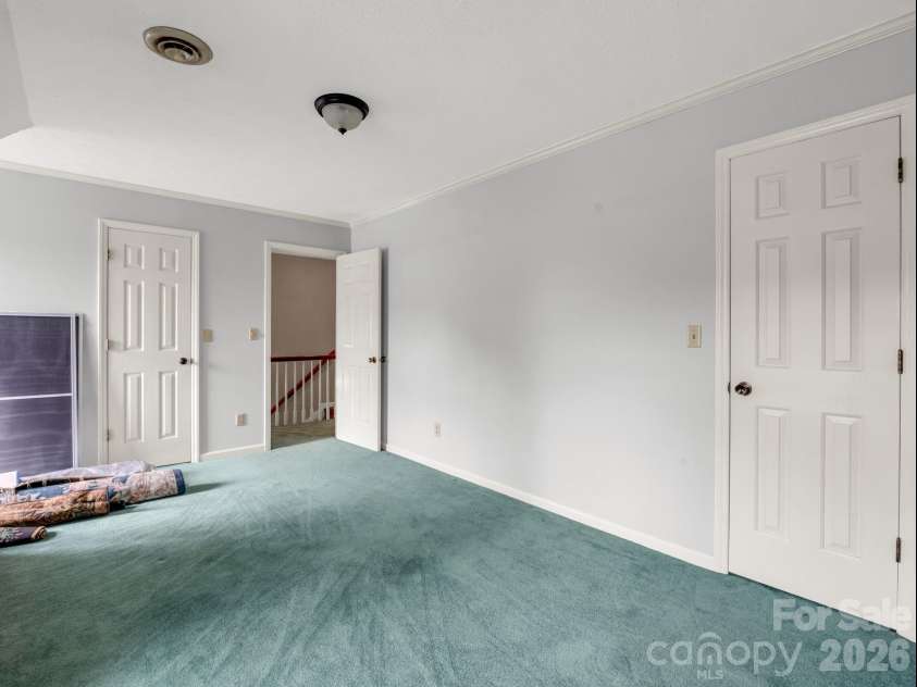 213 Raintree Drive, Hendersonville, NC 28791.  MLS# CAR4417820, YatesRealty ID 2304. Upper bedroom on right from stairs