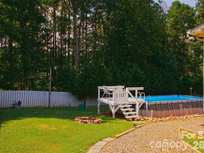 7010 Executive Circle, Denver, NC 28037.  MLS# CAR4383024, YatesRealty ID 23040. Backyard