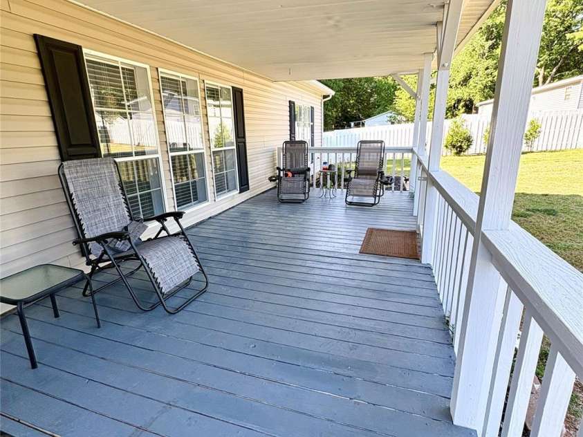 7010 Executive Circle, Denver, NC 28037.  MLS# CAR4383024, YatesRealty ID 23040. Freshly painted front porch