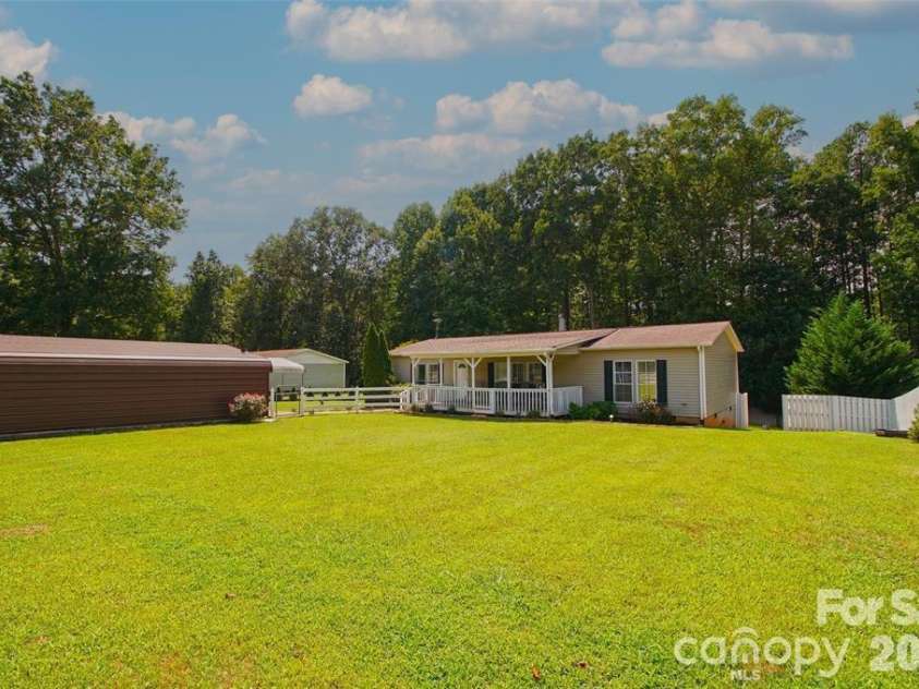 7010 Executive Circle, Denver, NC 28037.  MLS# CAR4383024, YatesRealty ID 23040. Front of house