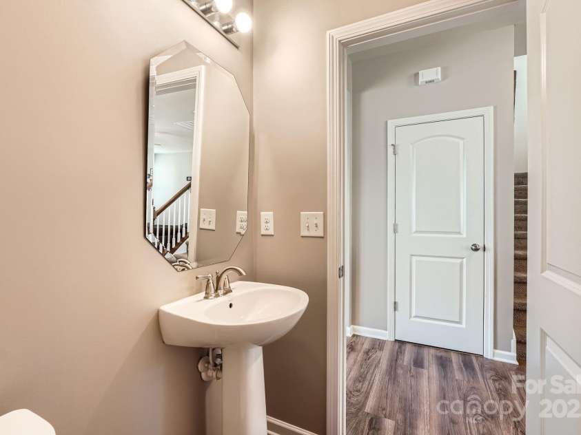 8726 Addingham Drive, Charlotte, NC 28269.  MLS# CAR4257512, YatesRealty ID 23040. 1st Floor 1/2 bathroom