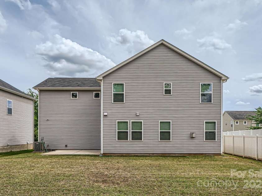 8726 Addingham Drive, Charlotte, NC 28269.  MLS# CAR4257512, YatesRealty ID 23040. Rear Exterior