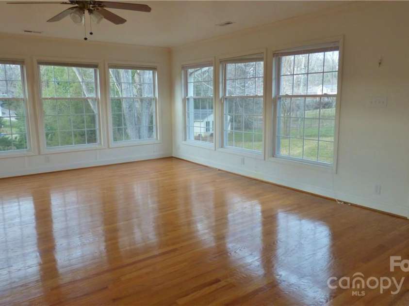 1245 Paddock Circle, Charlotte, NC 28209.  MLS# CAR4263851, YatesRealty ID 23047. Another view of Sunroom/Great Room.