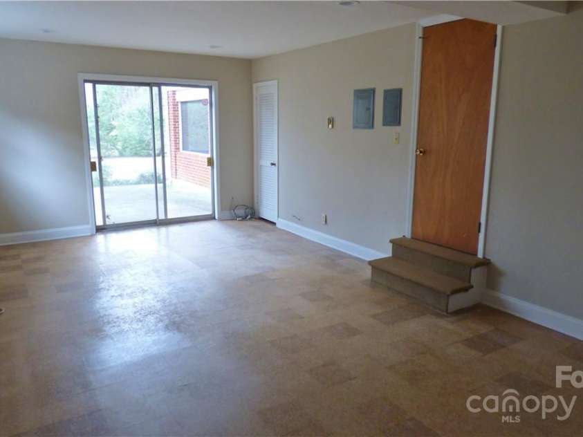 1245 Paddock Circle, Charlotte, NC 28209.  MLS# CAR4263851, YatesRealty ID 23047. Downstairs den with recessed lights