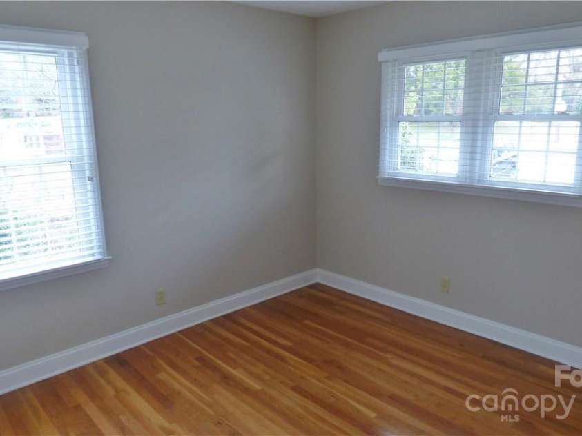 1245 Paddock Circle, Charlotte, NC 28209.  MLS# CAR4263851, YatesRealty ID 23047. Front, corner bedroom