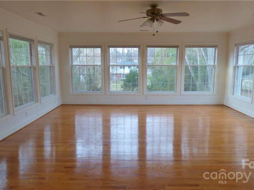 1245 Paddock Circle, Charlotte, NC 28209.  MLS# CAR4263851, YatesRealty ID 23047. Huge, bright Sunroom/Great Room.