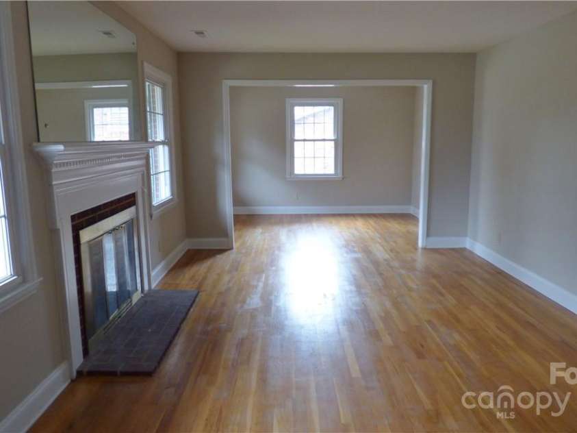 1245 Paddock Circle, Charlotte, NC 28209.  MLS# CAR4263851, YatesRealty ID 23047. Living Room from entry