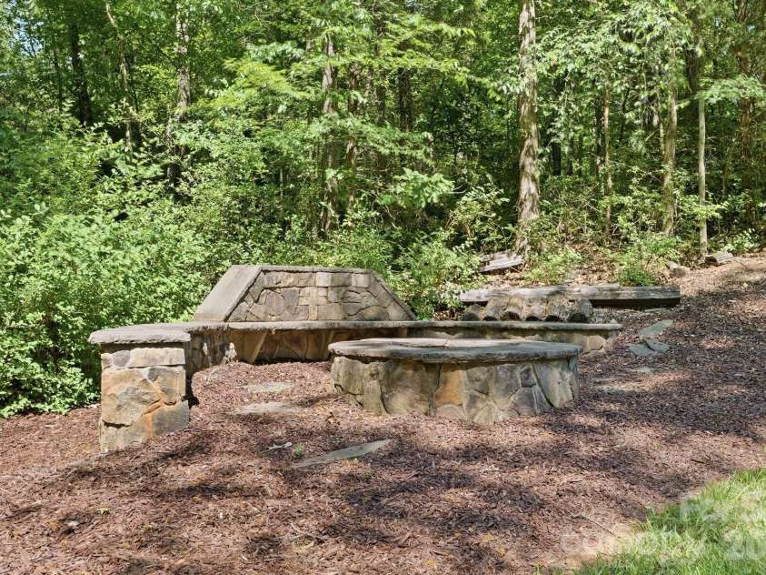 235 Grey Road, Davidson, NC 28036.  MLS# CAR4382846, YatesRealty ID 23048. Fire pit