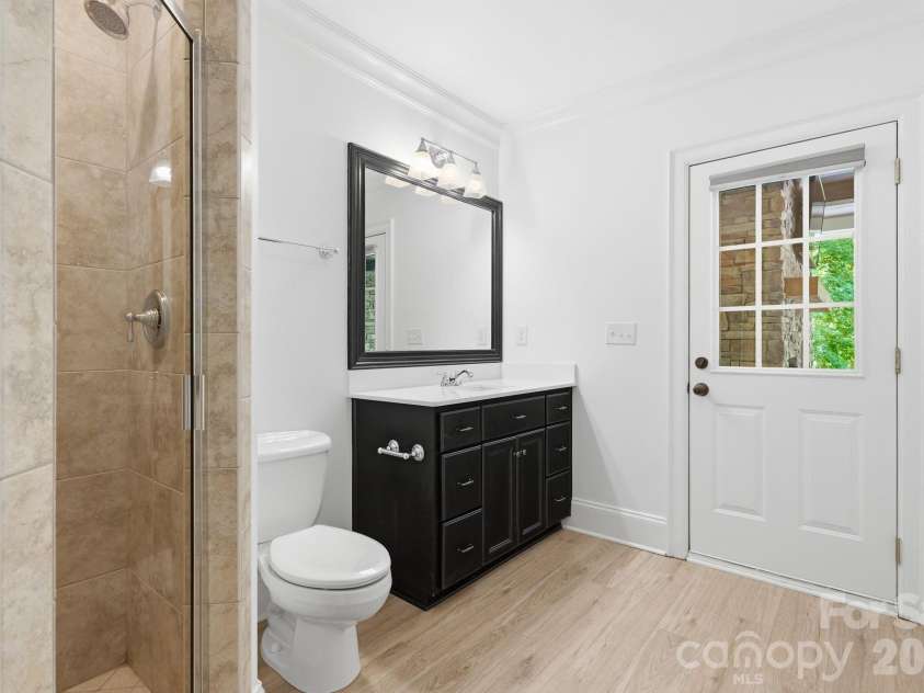 235 Grey Road, Davidson, NC 28036.  MLS# CAR4382846, YatesRealty ID 23048. Lower level full bath/pool bath